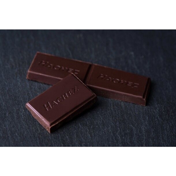 Hachez Cocoa d'Arriba Mango Chili 77% Dark Chocolate Bar open piece